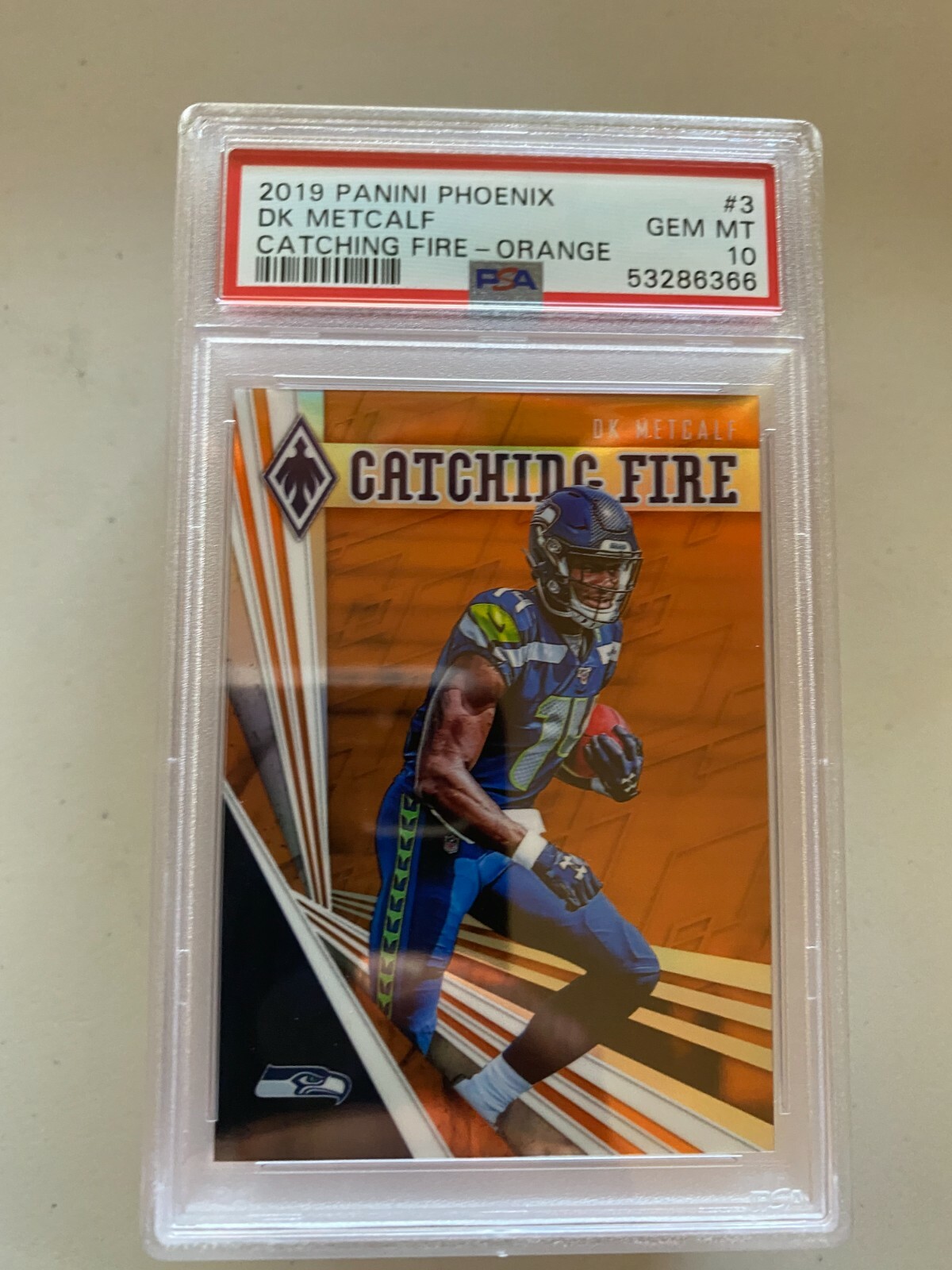 DK Metcalf Panini Phoenix Catching Fire #3 Orange