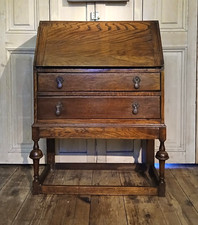 VINTAGE OAK BUREAU DESK WITH ATTRACTIVE TURNED LEGS AND DRAWERS ANTIQUE