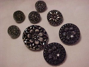8 Black Glass Buttons Mostly Different Sizes From 1/2in. to 1 in.  All Mint!!!