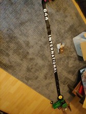 IHC International 644 naklejka okap lewy oryginalny bez taniego przedruku 