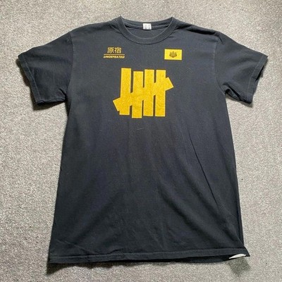 UNDEFEATED T-Shirt Herren M schwarz gold Grafik vorne hinten UNDFTD 5 Logo Streetwear