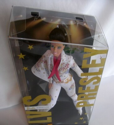 Barbie Signature poupée de Collection Elvis Presley aux Longs Cheveux Bruns Portant Une Combinaison Jumpsuit Blanche, Jouet Collector, GTJ95 | Votre wishlist sur Barbie Signature poupée de Collection Elvis Presley aux Longs Cheveux Bruns Portant Une Combinaison Jumpsuit Blanche, Jouet Collector, GTJ95 | Votre wishlist sur