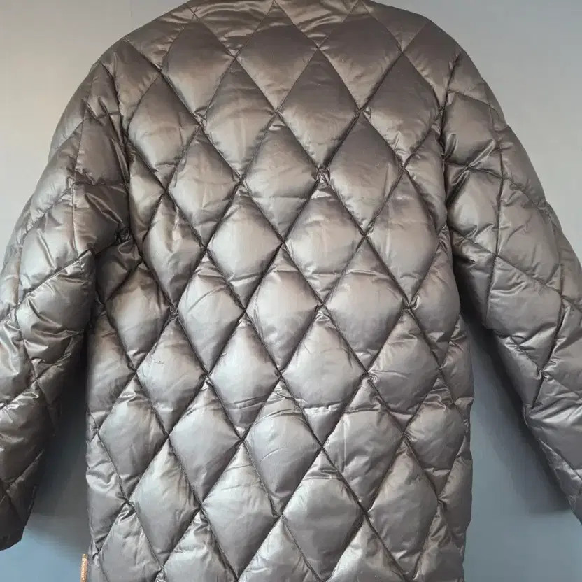 Moncler Women's Padded Coat with Elegant Tone-On-Tone Design