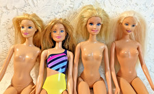 4 Barbie Dolls