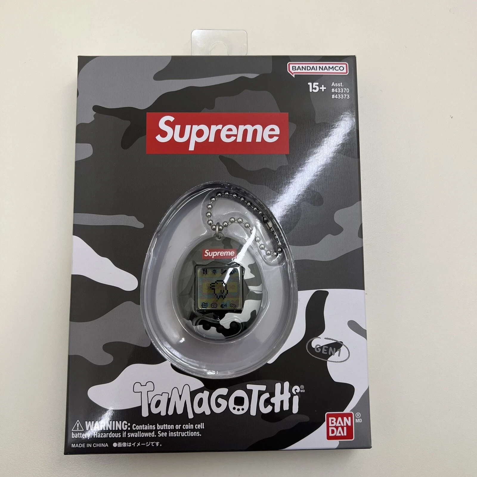 Supreme X Tamagotchi, camouflage noir/blanc/neige, jouet neuf dans sa boîte scellé