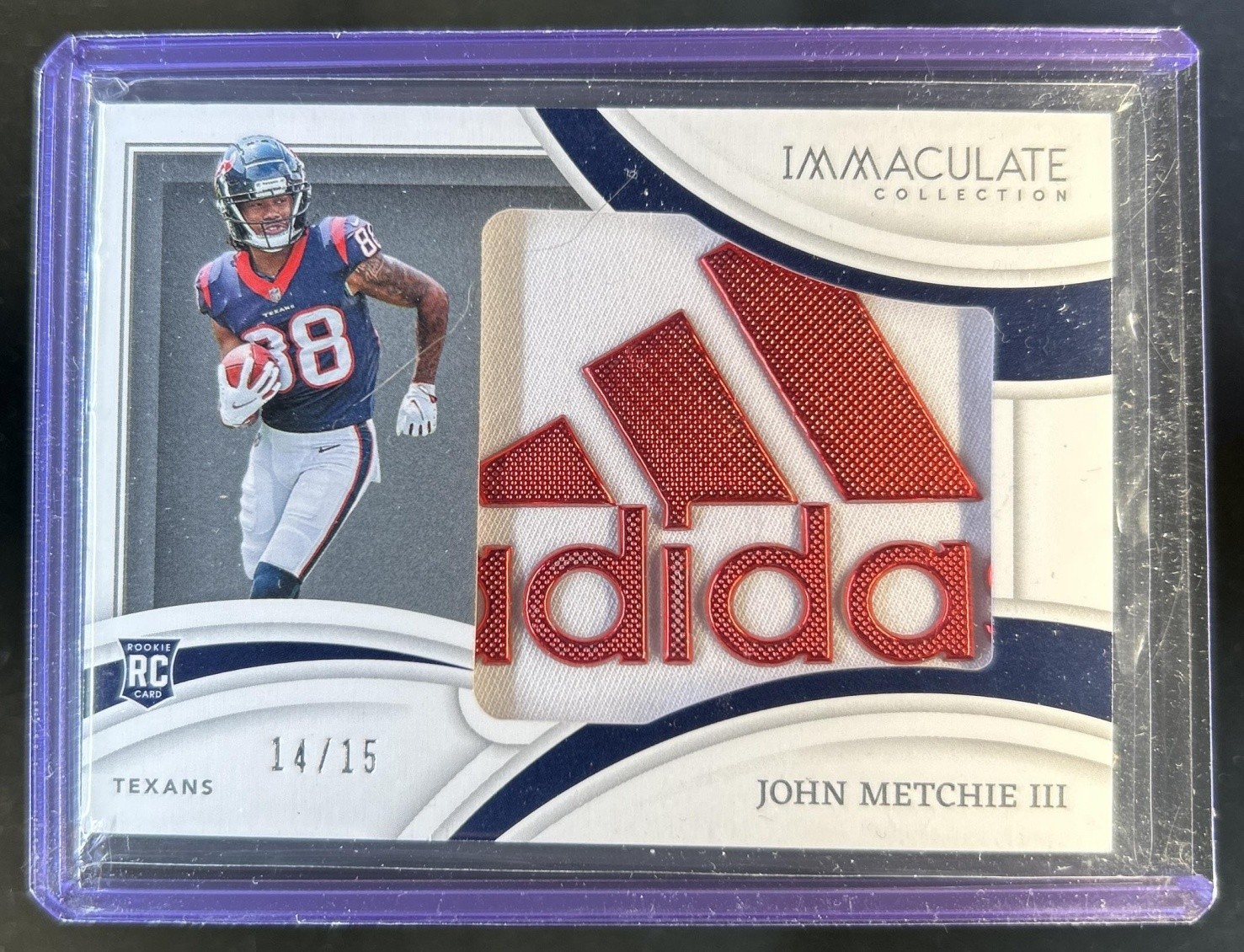 John Metchie Panini Immaculate Collection Rookie Logos #RLJME Gloves-Brand Logo