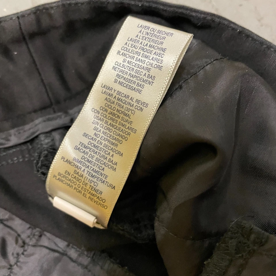 Pantalones plisados curvilíneos de cintura definida negros Rafaella para mujer 10 Foto 4 de 4