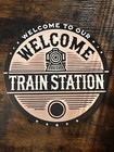 Welcome To Our Train Station Metal Sign 7-3/4” Diameter