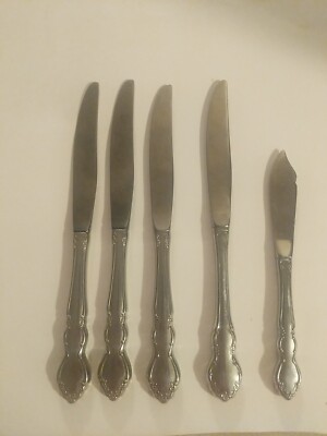 Oneida Dover Dinner Knives Set Of 4 ( 1 Different Pattern) & 1 Butter Spreader