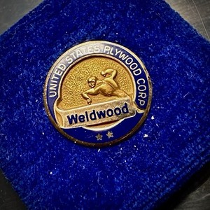 Vintage United States Plywood Corporation (USP), branded with Weldwood lapel pin