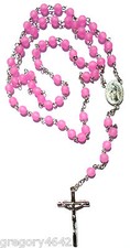 CHAPELET  COULEUR TRANSLUCDE ROSE  SUR CHAINE ARGENTEE