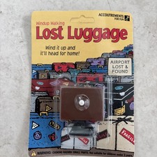 Accouterments Wind-Up Walking Lost Luggage . ...