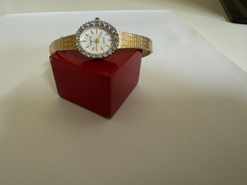NOS Ladies Geneve yellow gold tone white bezel Petite watch 18mm