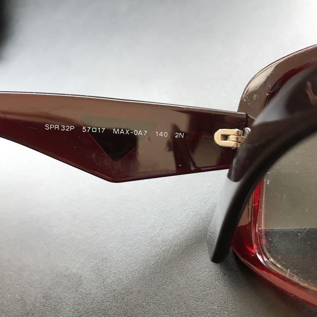 PRADA Sunglasses with Triangle Logo Plate Clear Red From