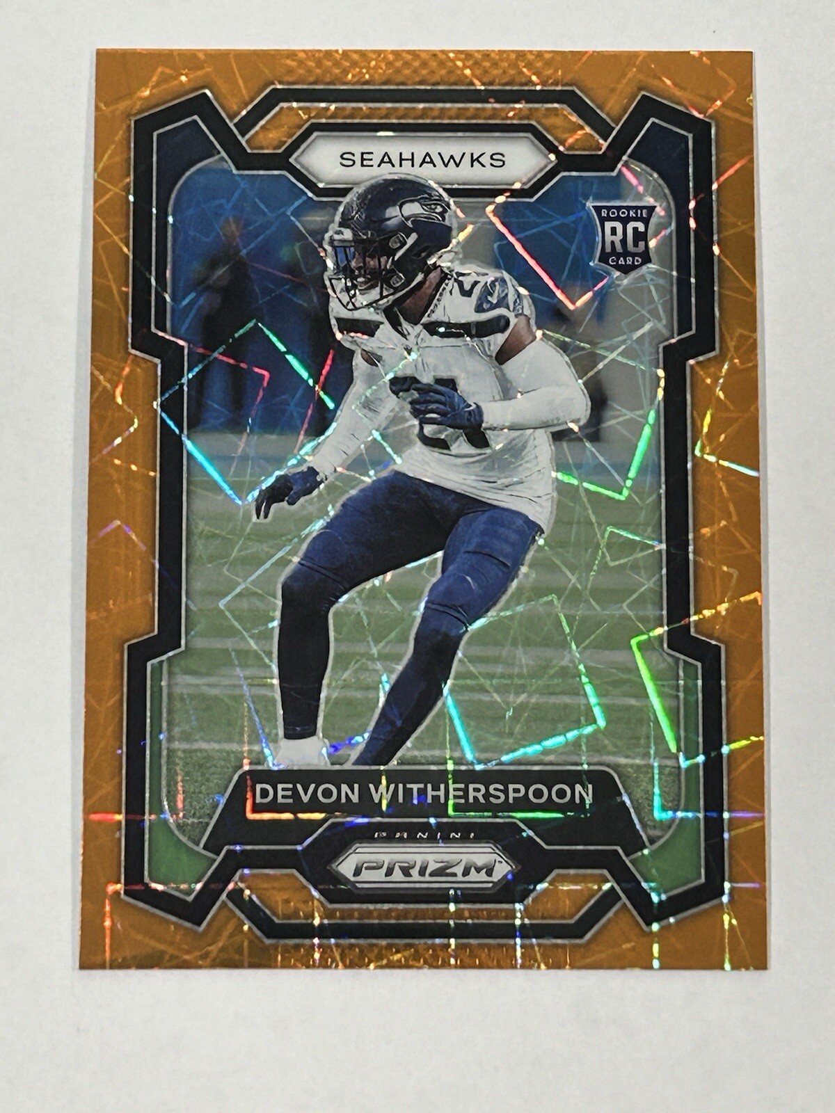 2023 Panini Prizm - Orange Lazer Prizm #389 Devon Witherspoon (RC)