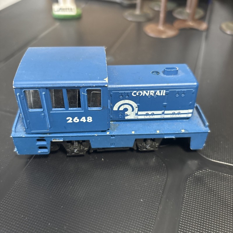 ho diesel locomotive conrail ahm 2648 runs on track