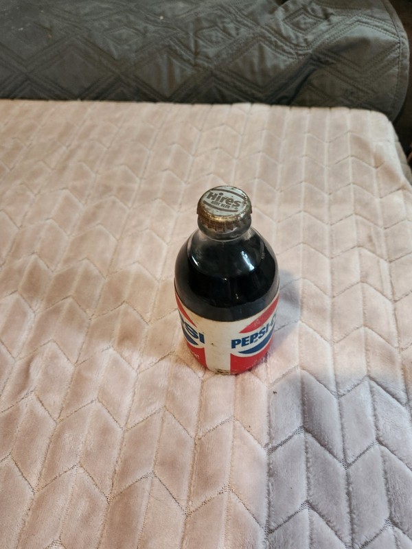 pepsi bottle-glass- sealed from bottler in memphis area w/ hires root beer top