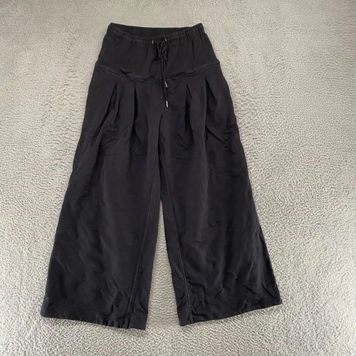 FP Movement Studio Siren Sweatpants Womens Medium Black Wide Leg Baggy Pleated