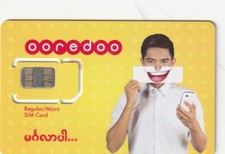 Myanmar - GSM / SIM - ooredoo "niño joven con teléfono móvil y máscara" - SIN USAR