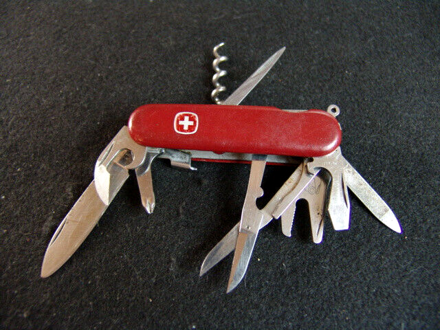 WENGER NOMAD-- w/ FILE--LOCKING--RARE--RETIRED--SWISS ARMY KNIFE
