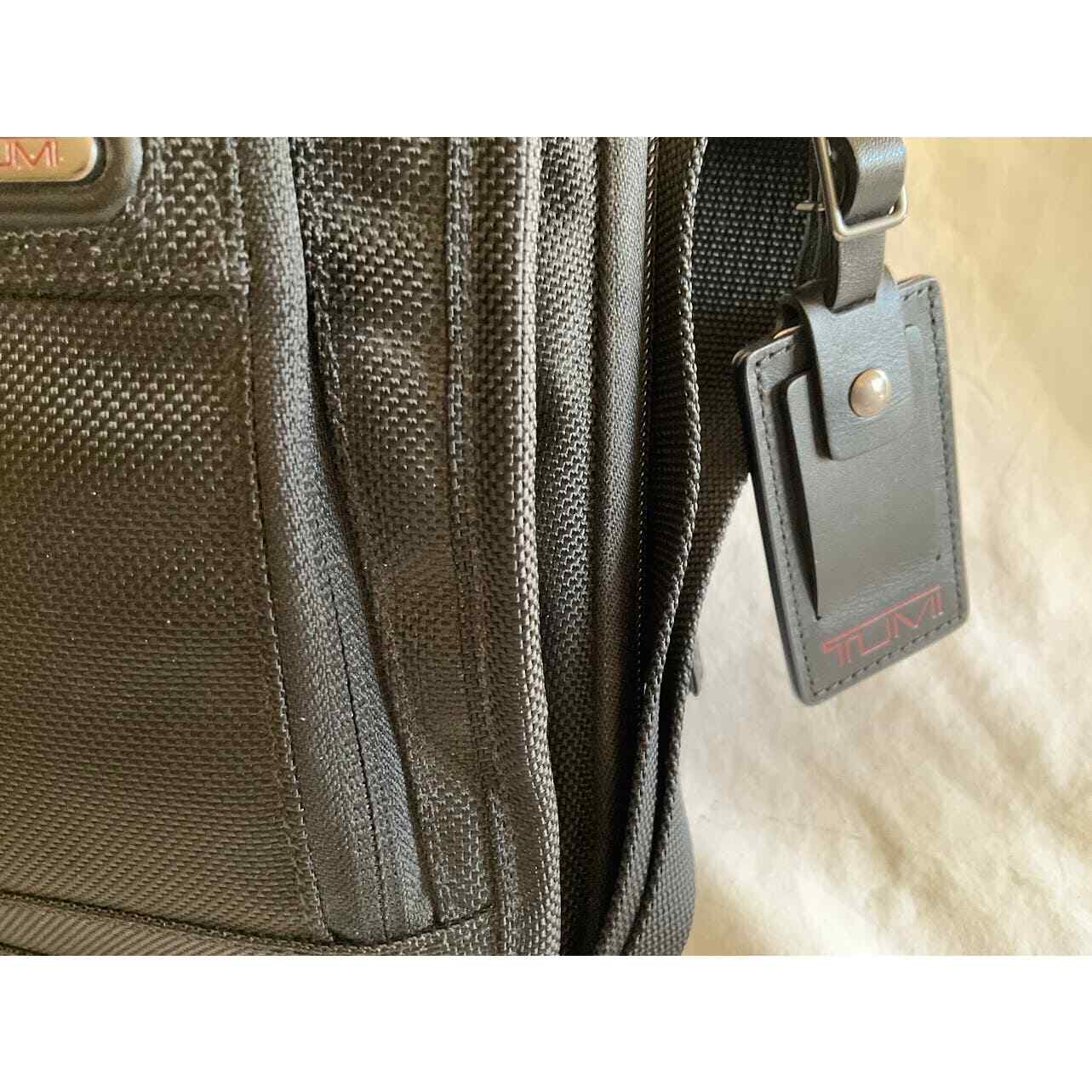 TUMI Crossbody Bag with Ipad Tablet Case Black Nylon Adjustable Strap Travel 