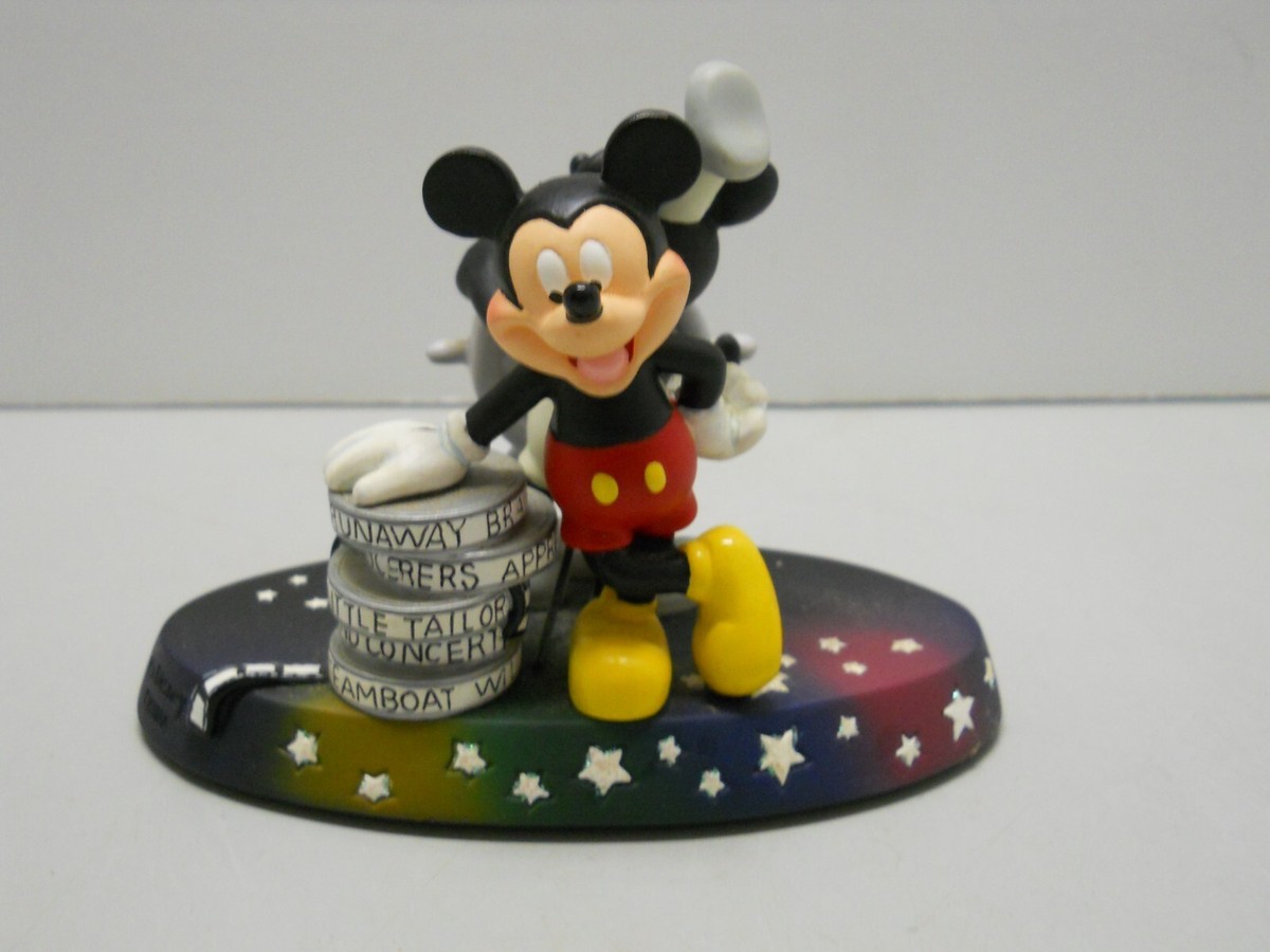 Walt Disney Mickey Mouse with Films and Steamboat Willie Desktop