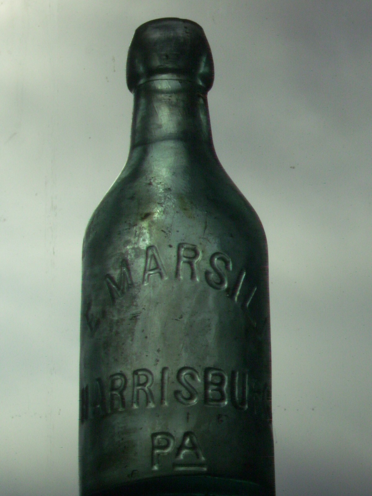 Vintage blue embossed  E. Marsili Harrisburg, Pa. affixed blob top glass bottle