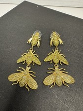 gold-toned bee dangle earrings feature yellow rhinestone detailing
