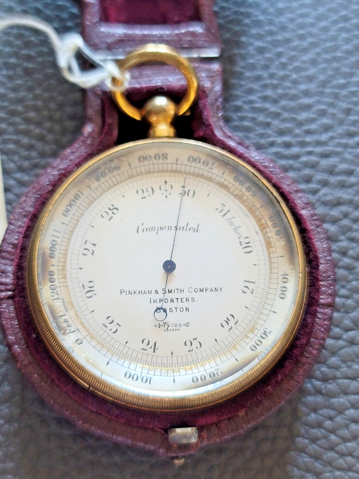 A genuine Victorian-era pocket barometer from Pinkham & Smith in its original leather case — a pocket-sized piece of scientific history that still works.