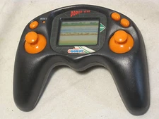 DODGE-EM Manley Toy Quest hand held electronic LCD video game 1998