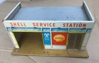 METTOY Playthings SHELL SERVICE STATION **Tin with plastic opening door**
