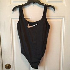 Nike Women  s size L runs small Black silver Logo 1 pc NWOT Swim Suit DW742