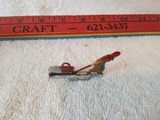 1920's HANS HEINRICHSEN flat lead figure Woman Plulling Sled collectible a