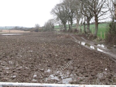 Photo 6x4 Rain soaked ploughed land in a hollow between drumlins Tyrella  c2012