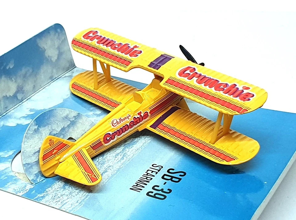 Matchbox Sky-Busters SB-39 Stearman Kaydet Bi-Plane Cadbury's Crunchie - Amarillo Foto 2 de 4