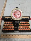 marx vintage toy dial typewriter, undated, tin