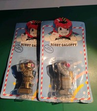 Vintage-Spielzeug namens Robby Galoppy Golden Silbern Roboter 2 Stück Set Retro