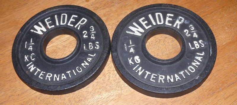 set of 2 vintage Weider International olympic 1.25kg 2.75lb weight plates