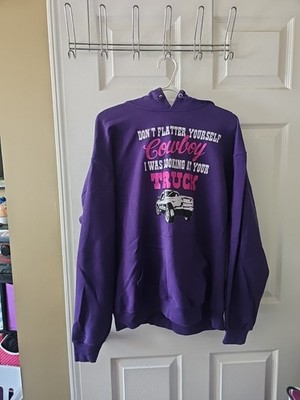 Purple Hoddie Size L WITH THE WORDS SAYONG DONT FLATTER YOURSELF COWBOY I WAS