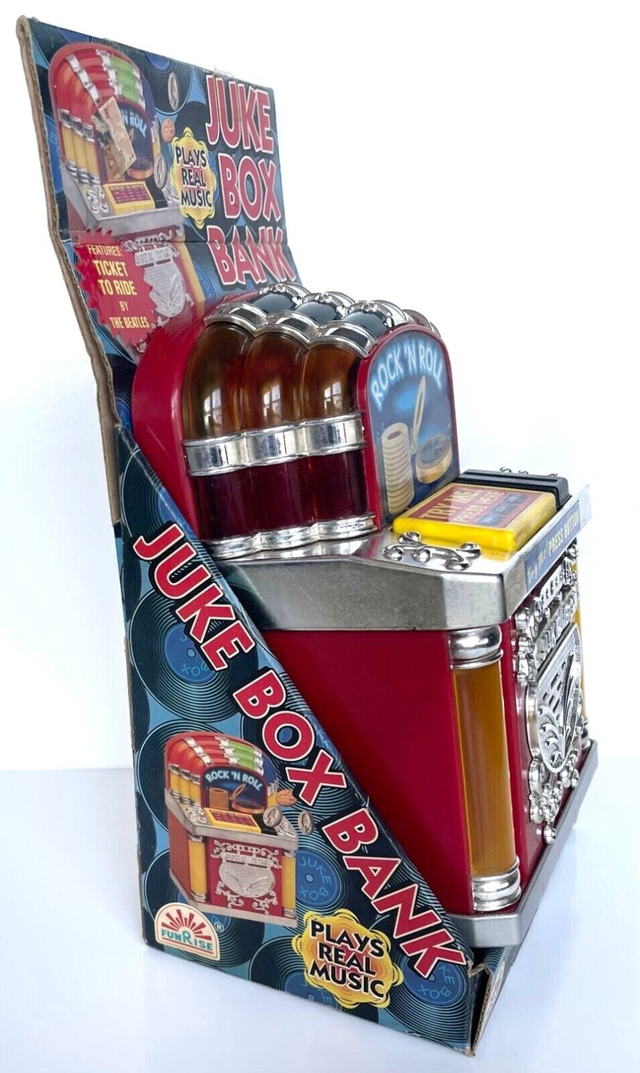 NEW BEATLES JUKE BOX BANK PLAYS 