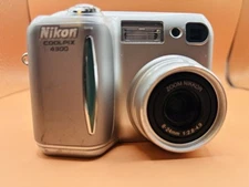 Nikon COOLPIX  E 4300 4.0MP Digital Camera - Silver works