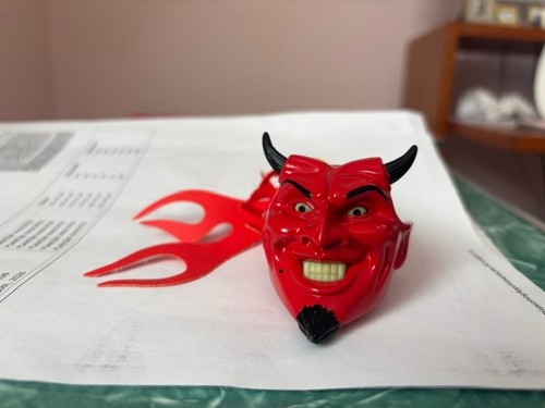 Red devil head antenna topper