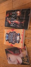 3 books Firelight- Jordan, Highly Unusual Magic, Rebel of the Sands- Hamilton
