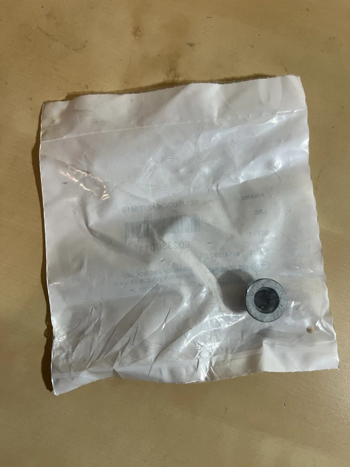 Silenciador y tuerca de tubo originales Subaru 902330011/9023300119R Foto 2 de 2