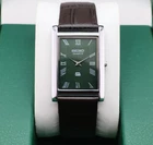 Vintage Seiko Slim Quartz Men's Wrist Watch Green Dial with Dark Brown Strap.