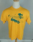 Yellow short-sleeve T-shirt with green tropical beach scene graphic and “Caribbean ’89 No Problem!” text.
