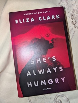 She's Always Hungry: Stories by Eliza Clark Very Good, Used Paperback