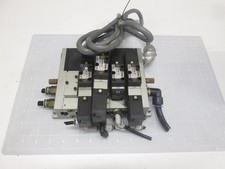 LOT OF 4 SMC NVFS2200-5FZ SOLENOID VALVES W/ MANIFOLD T66249
