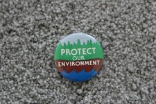 "Protect our Environmet" ecology metal pinback. 1980s vintage.