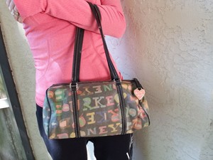 black purse with outside pockets